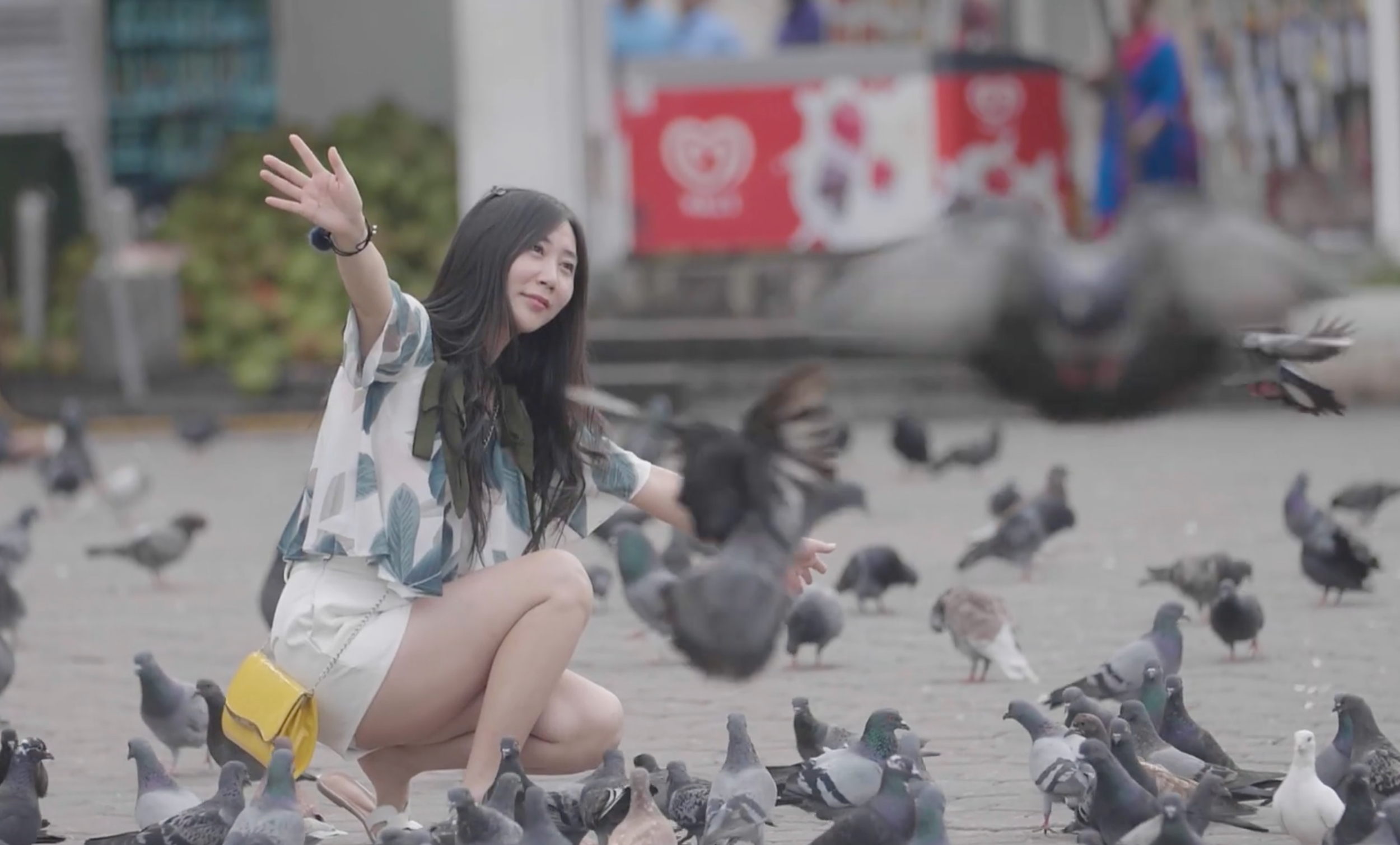 Candid human moment captured during documentary filming in public square