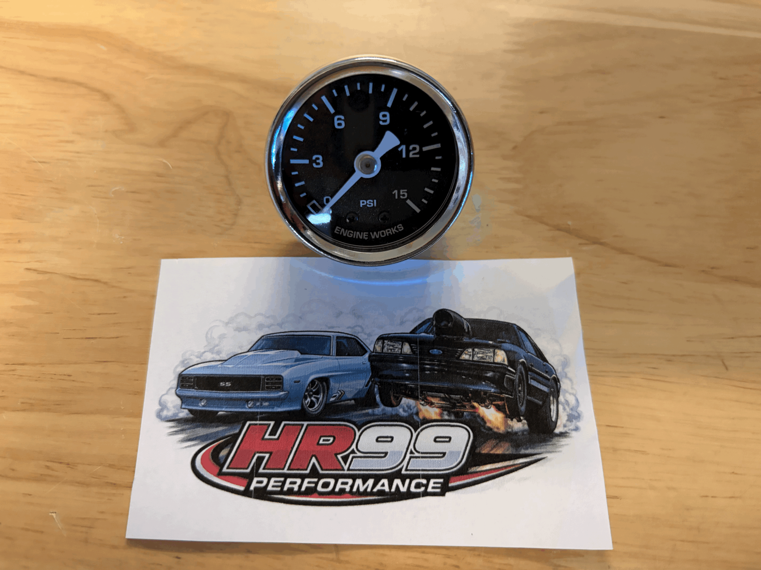 FUEL PRESSURE GAUGE 0-15 PSI . BLACK FACE W/ WHITE NUMBERS. 1.5''