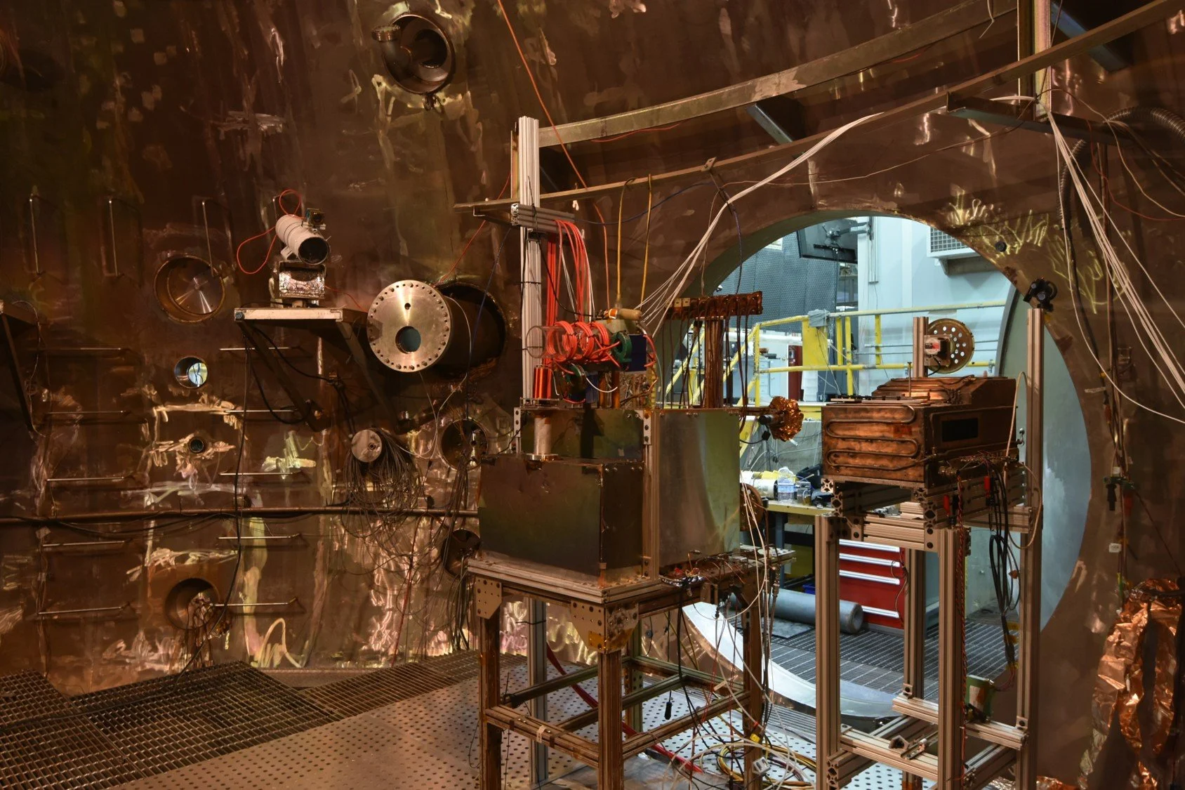 Experimental test-setup for a new type of electric propulsion, the magneto-inductive plasma engine), at the Space Propellants Environmental Facility (SPEF) at Edwards AFB, AFRL. Plasma speeds (exhaust velocity) reached up to 40 km/s. 