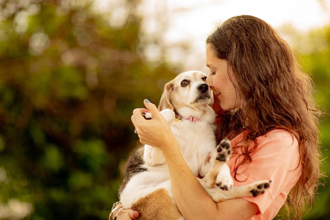 breathwork-and-creativity-coach-holding-dog