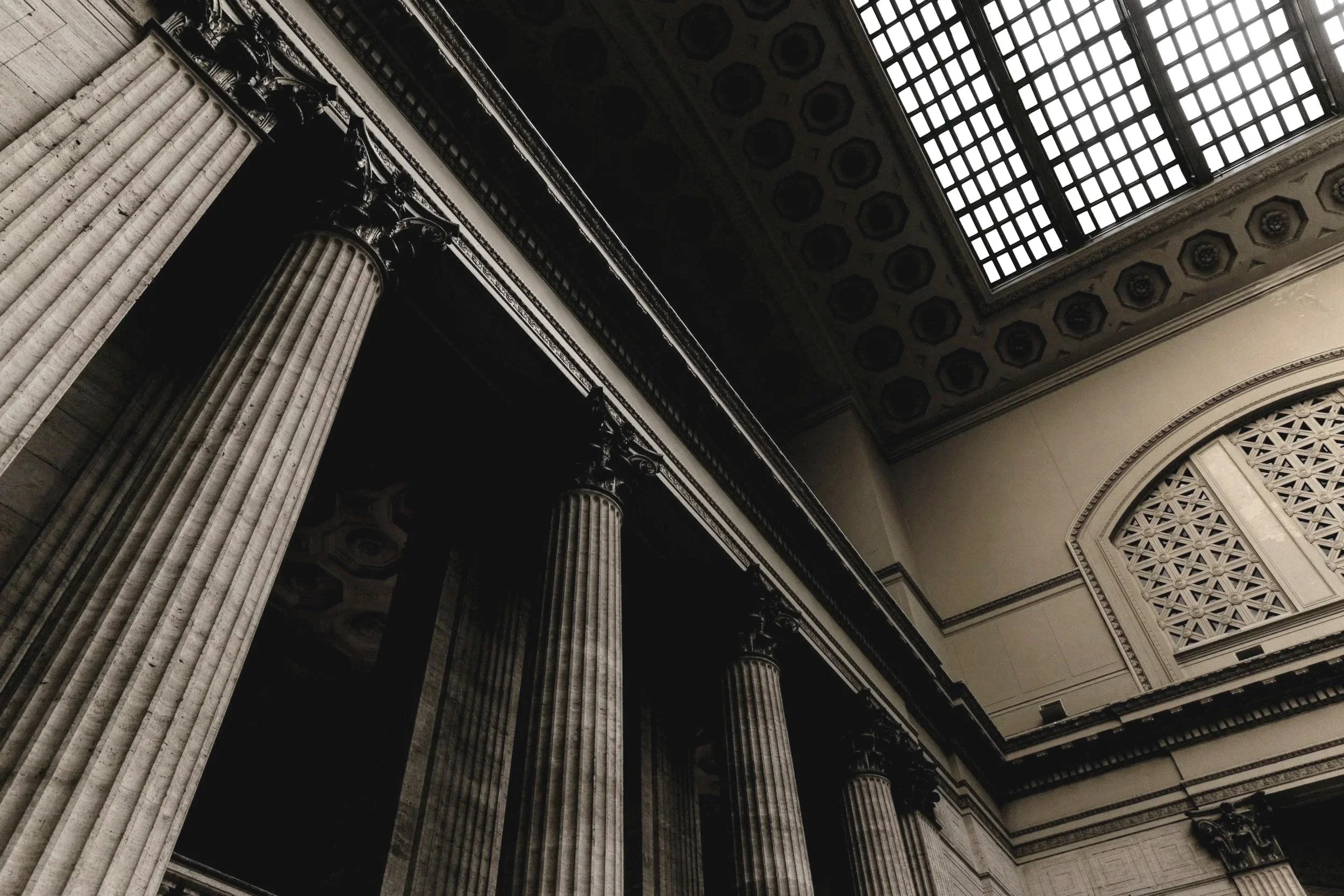 Columns inside a building with shadows