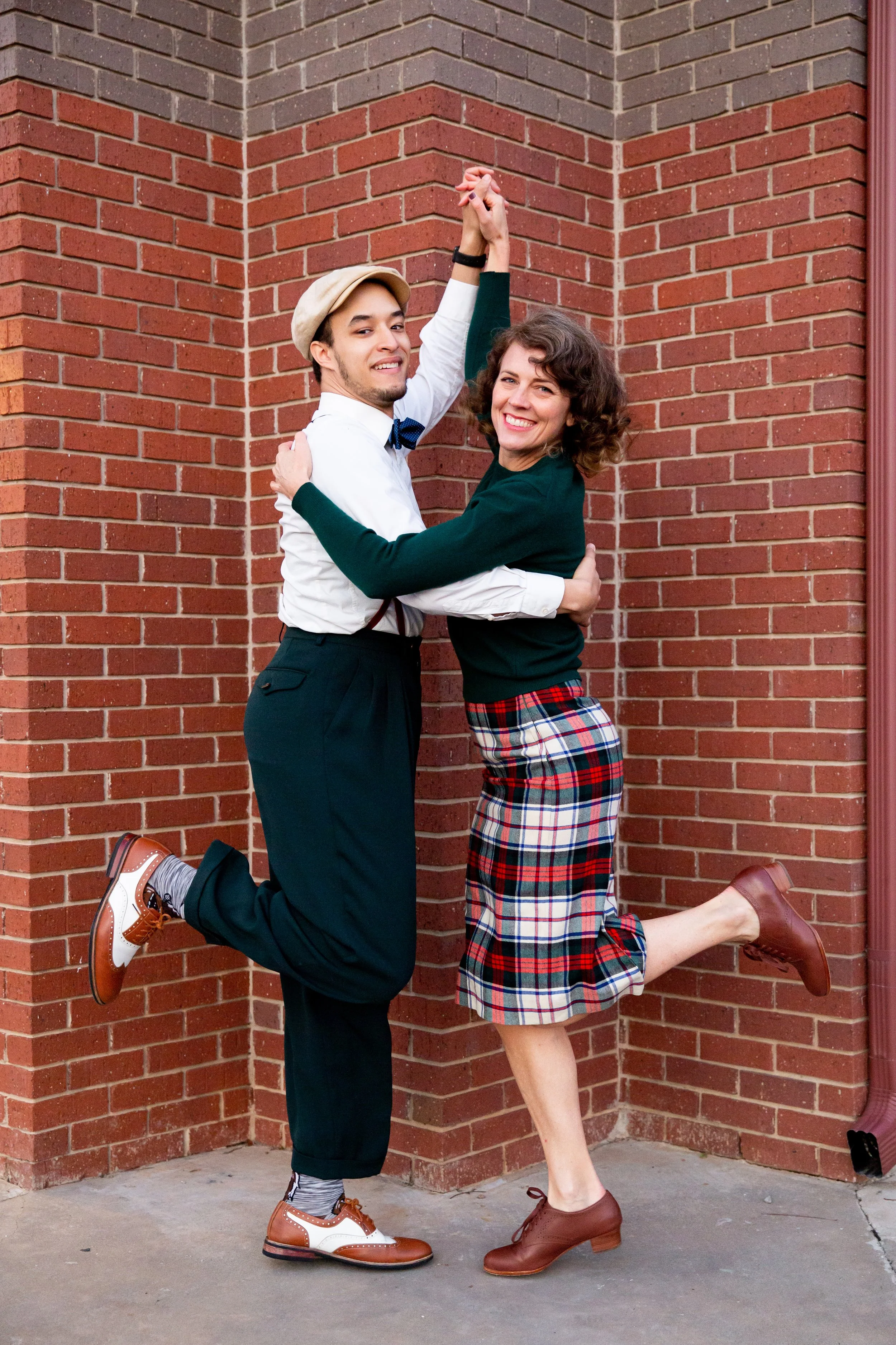 Amanda and Zach modeling the closed position Shag basic, smiling at the camera