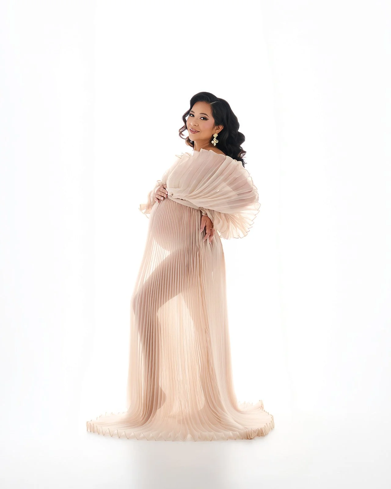 Luxury maternity portrait photographed in a Cypress TX studio near Houston