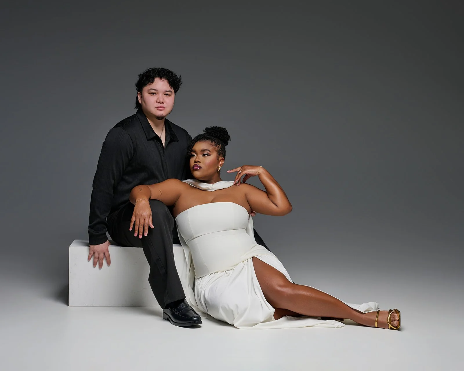 Elegant couples portrait photographed in a professional studio serving Houston and Cypress Texas families