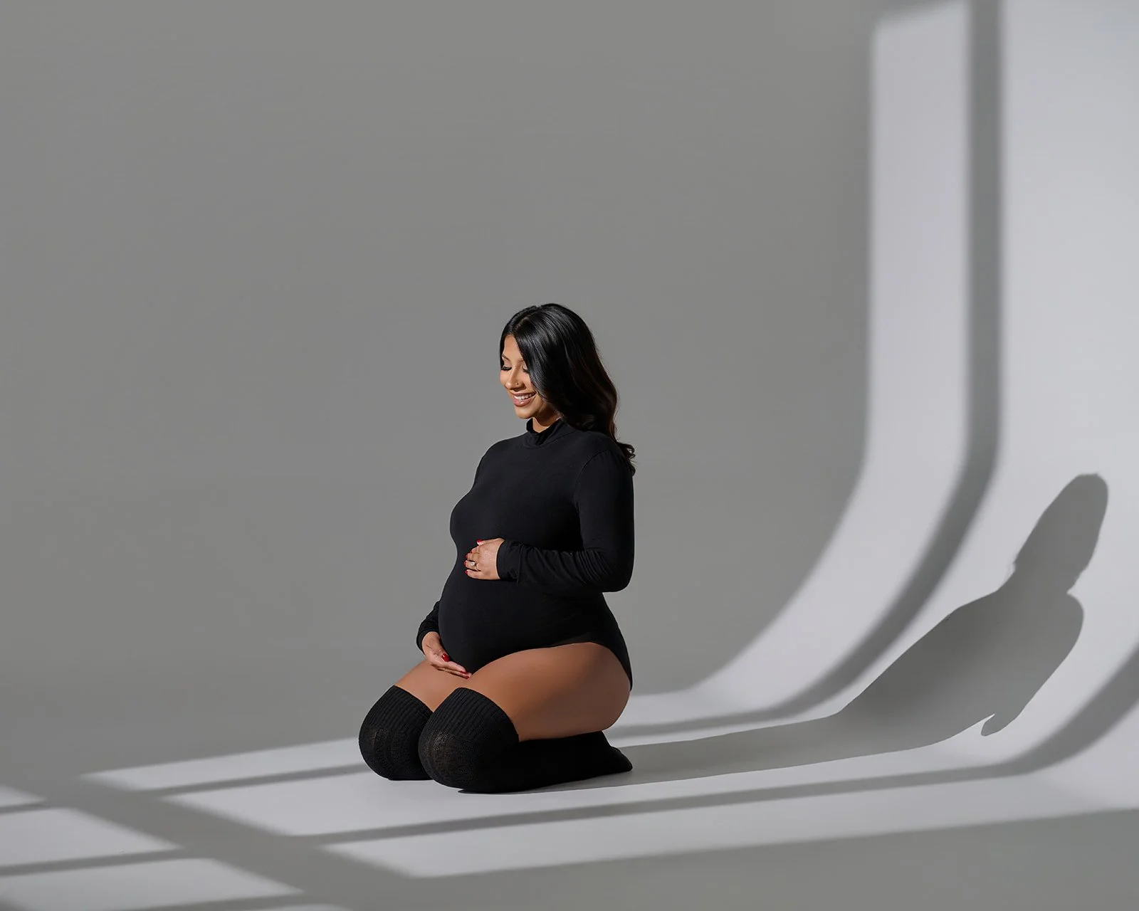 Pregnancy portrait session photographed in Cypress TX studio near Houston