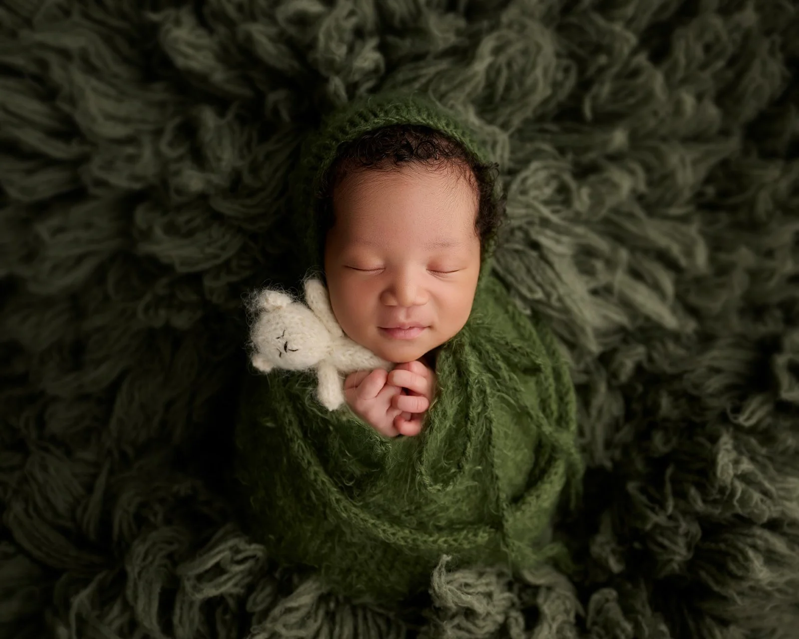 Newborn baby portrait photographed in Cypress TX studio serving Houston maternity and newborn clients