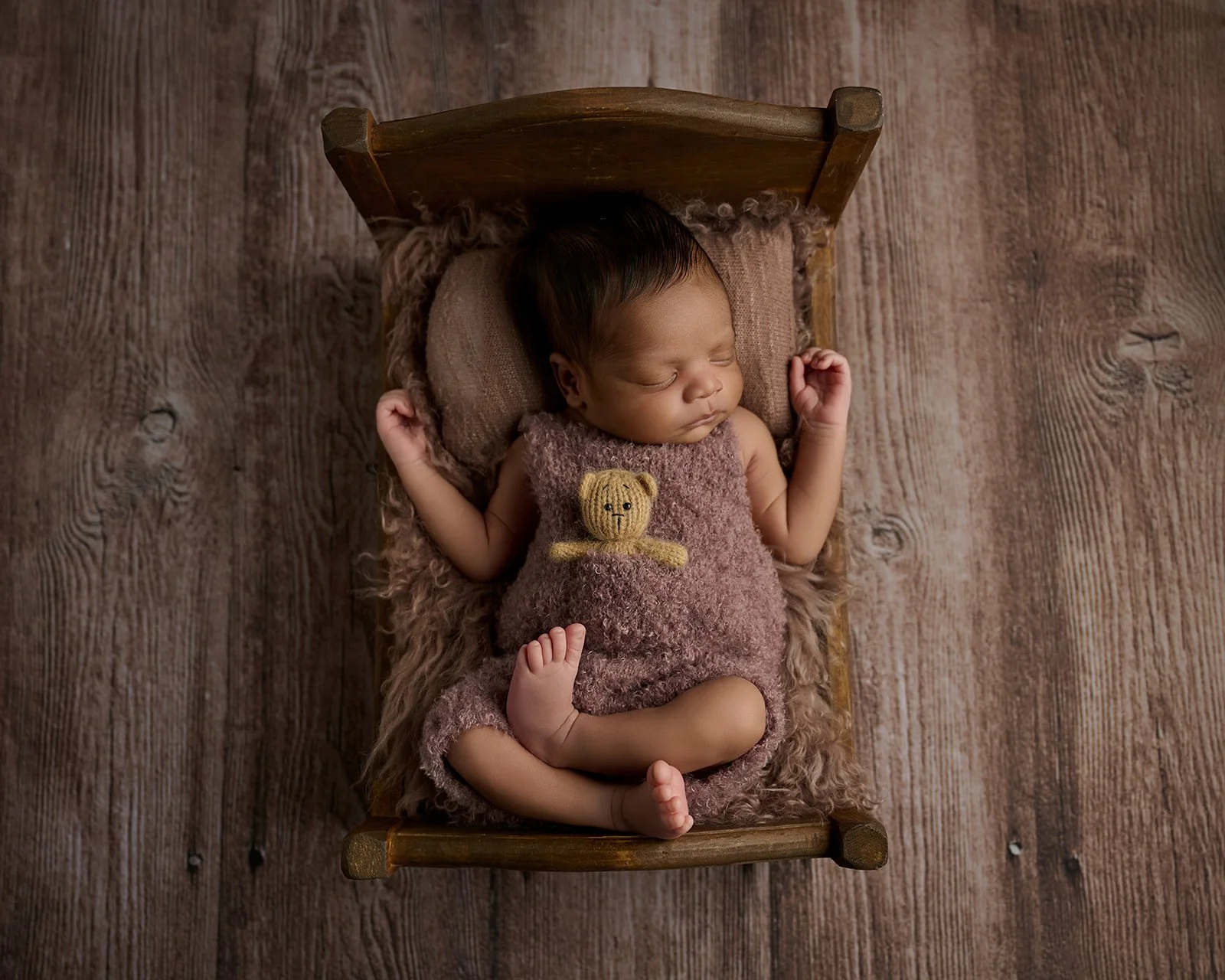 Studio newborn photography portrait created in Cypress TX serving Houston families