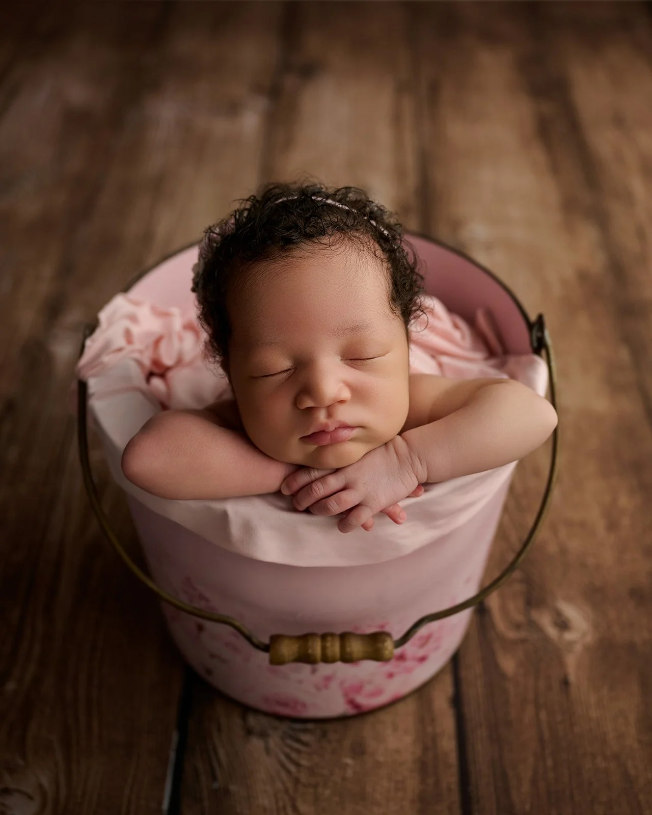 Newborn baby portrait photographed in a Cypress TX photography studio specializing in newborn photography