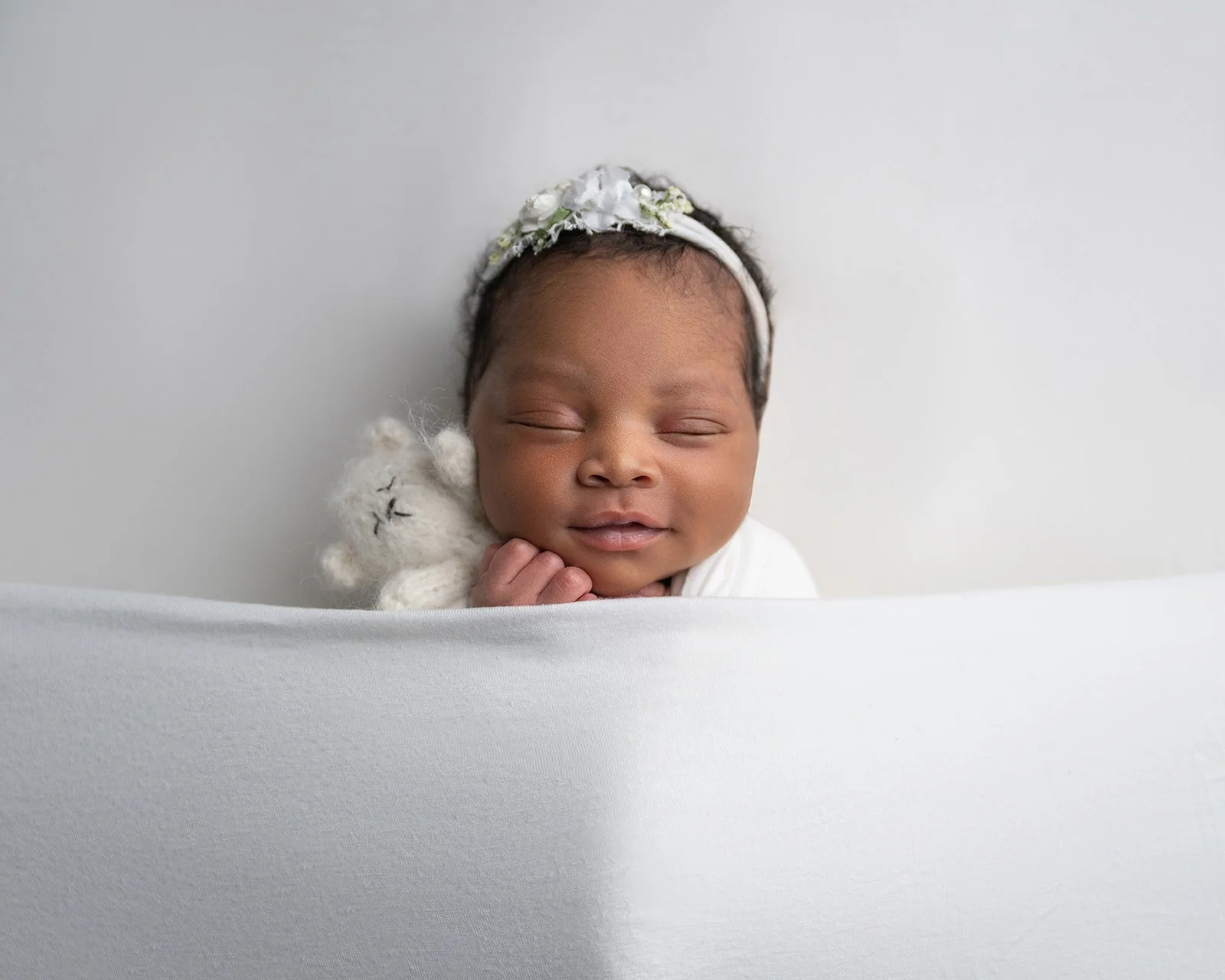 Fine art newborn portrait photographed in a Cypress TX studio by Houston newborn photographer Yancy Villatoro
