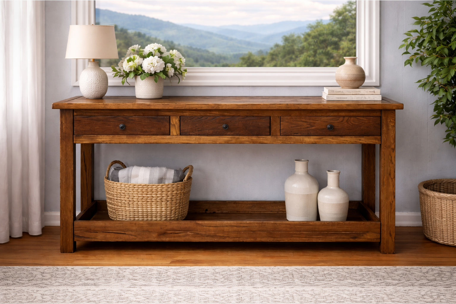Handcrafted rustic console table made from solid hardwood with a warm natural finish and lower storage shelf. Custom-built entryway or sofa table designed for durability and timeless farmhouse style.
