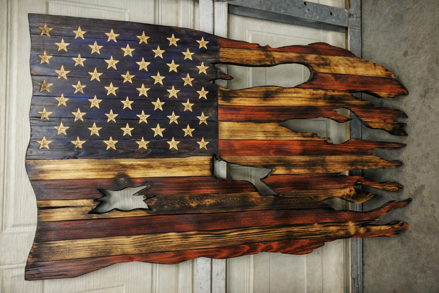 Handcrafted wooden American flag wall art made by Kickin Up Dust Woodworks.