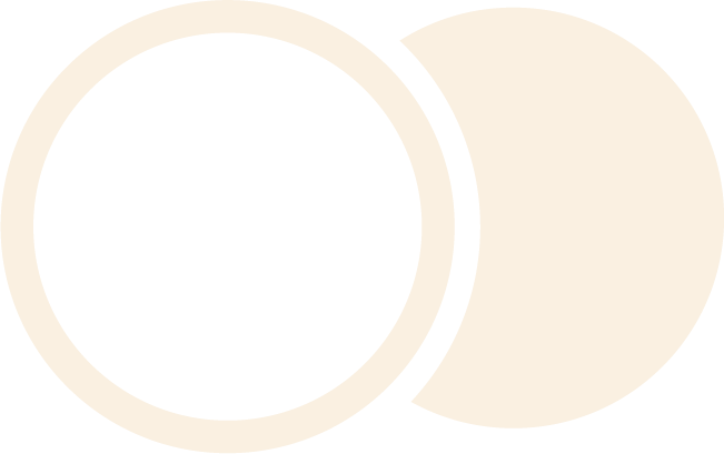 Illustration of two circles, one black with a white border and one solid white, overlapping each other.