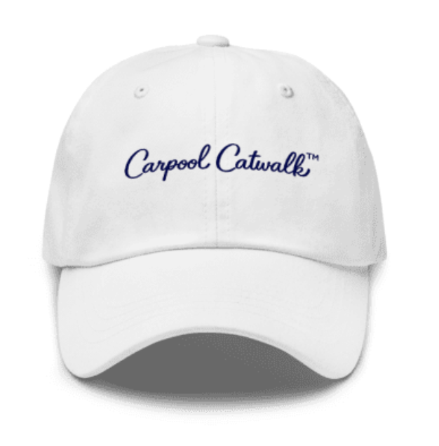The Carpool Catwalk Hat.  An elegant white baseball cap with the text "Carpool Catwalk™" embroidered in navy blue on the front.