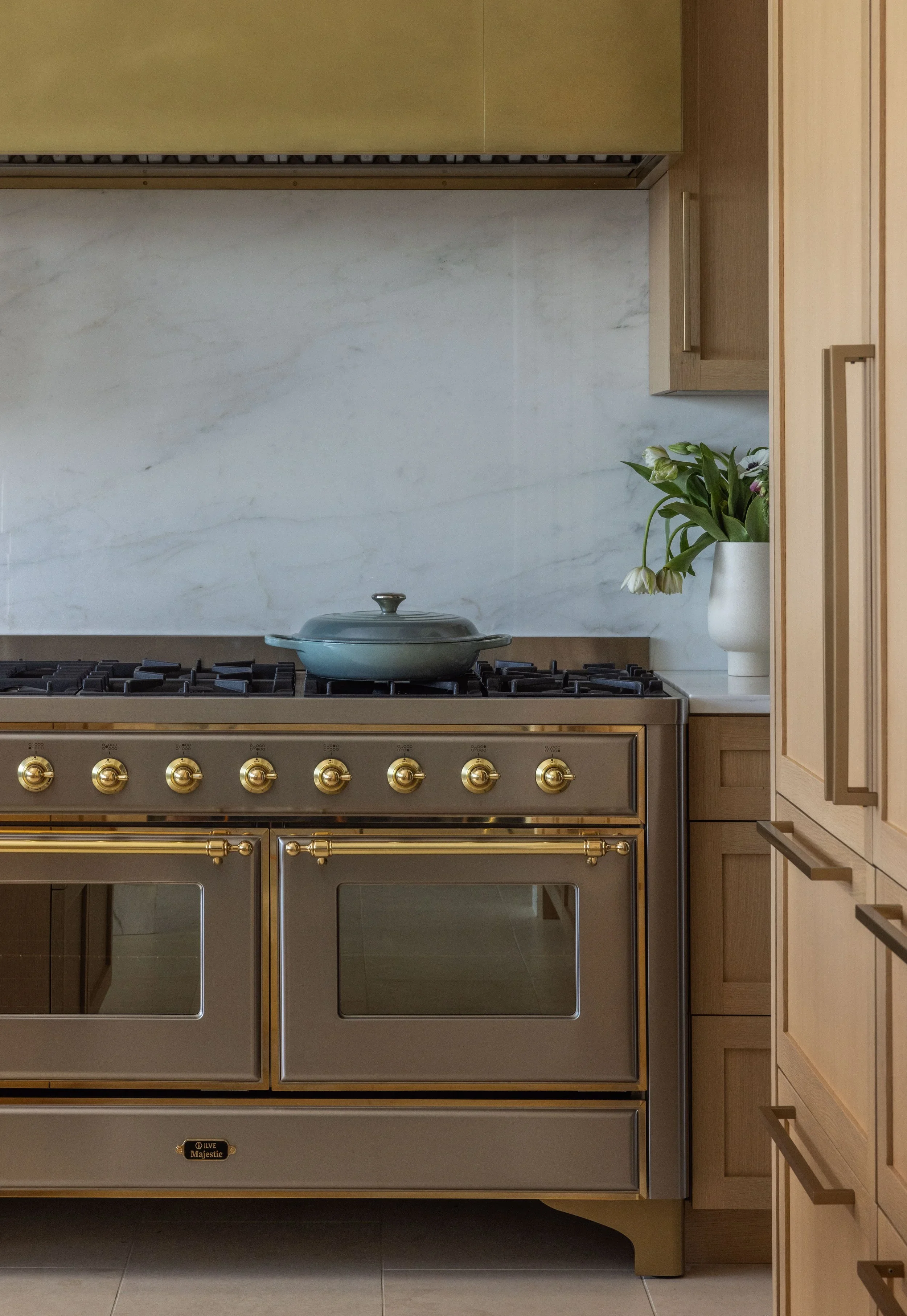 Custom+Kitchen+Design+range+hood+brass+details.webp