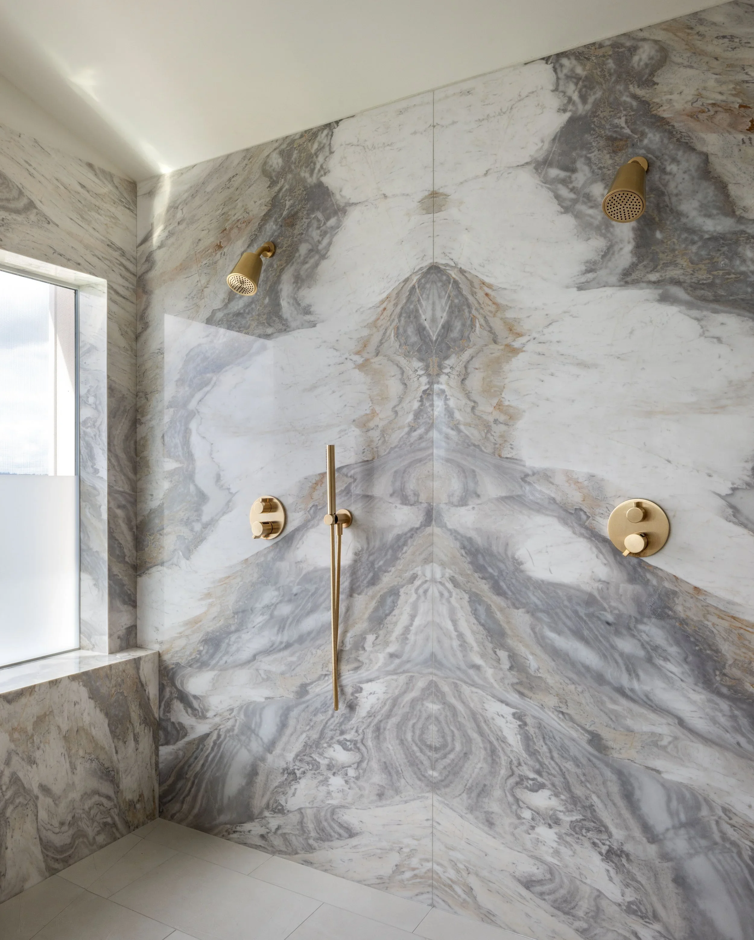 Bookmatched+Stone+Shower.webp