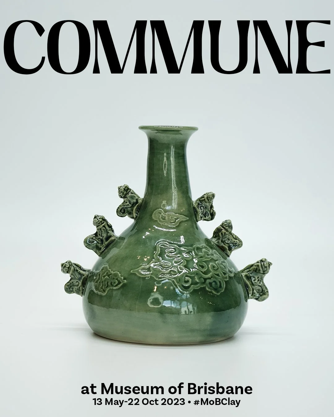 A green ceramic vase with dragon head motifs on the sides, displayed against a plain white background, with text indicating an exhibition at Museum of Brisbane from May to October 2023.