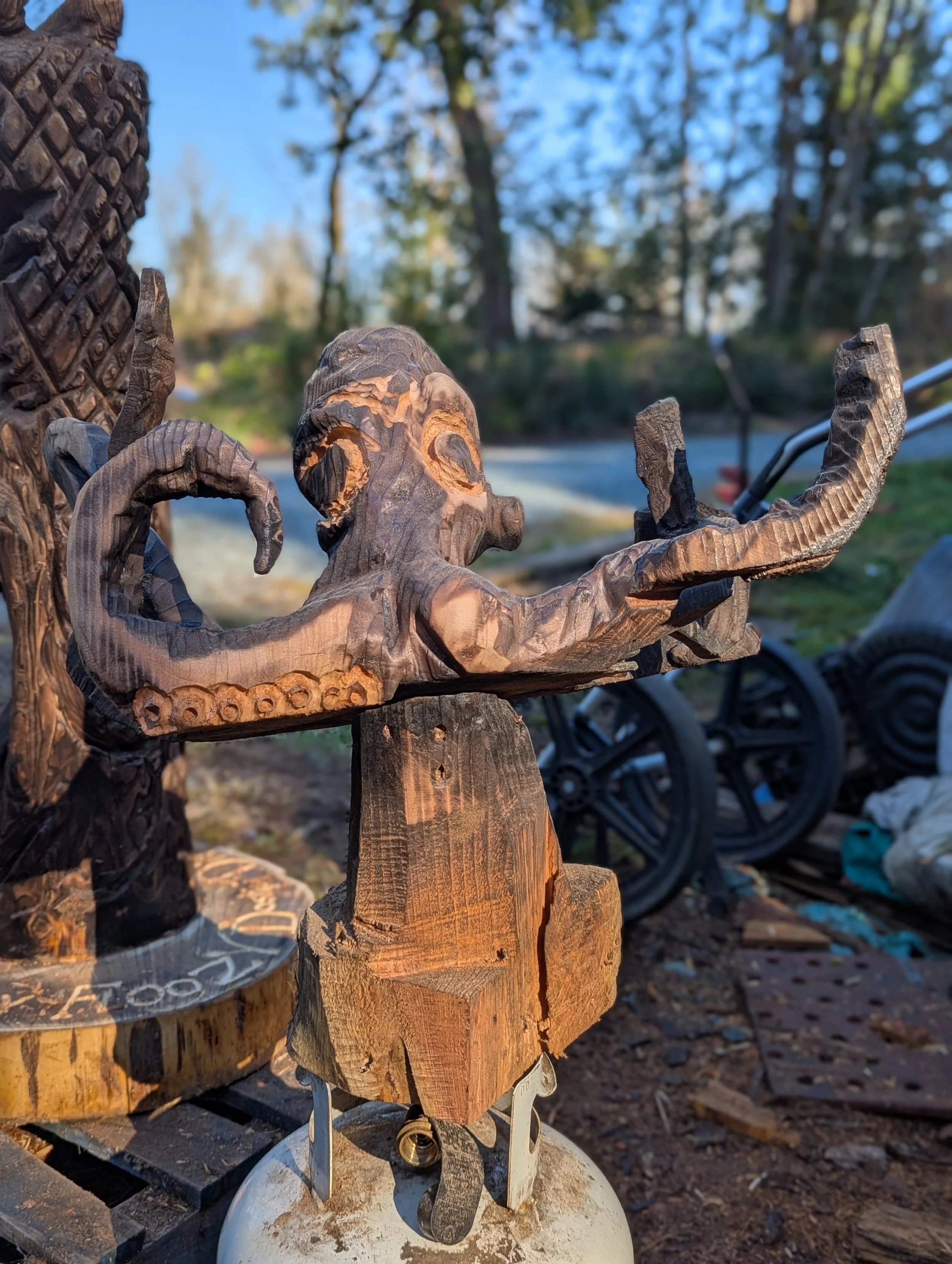 octopous - after being burned, rubbed, and more details carved with chainsaw by Justin Spalek