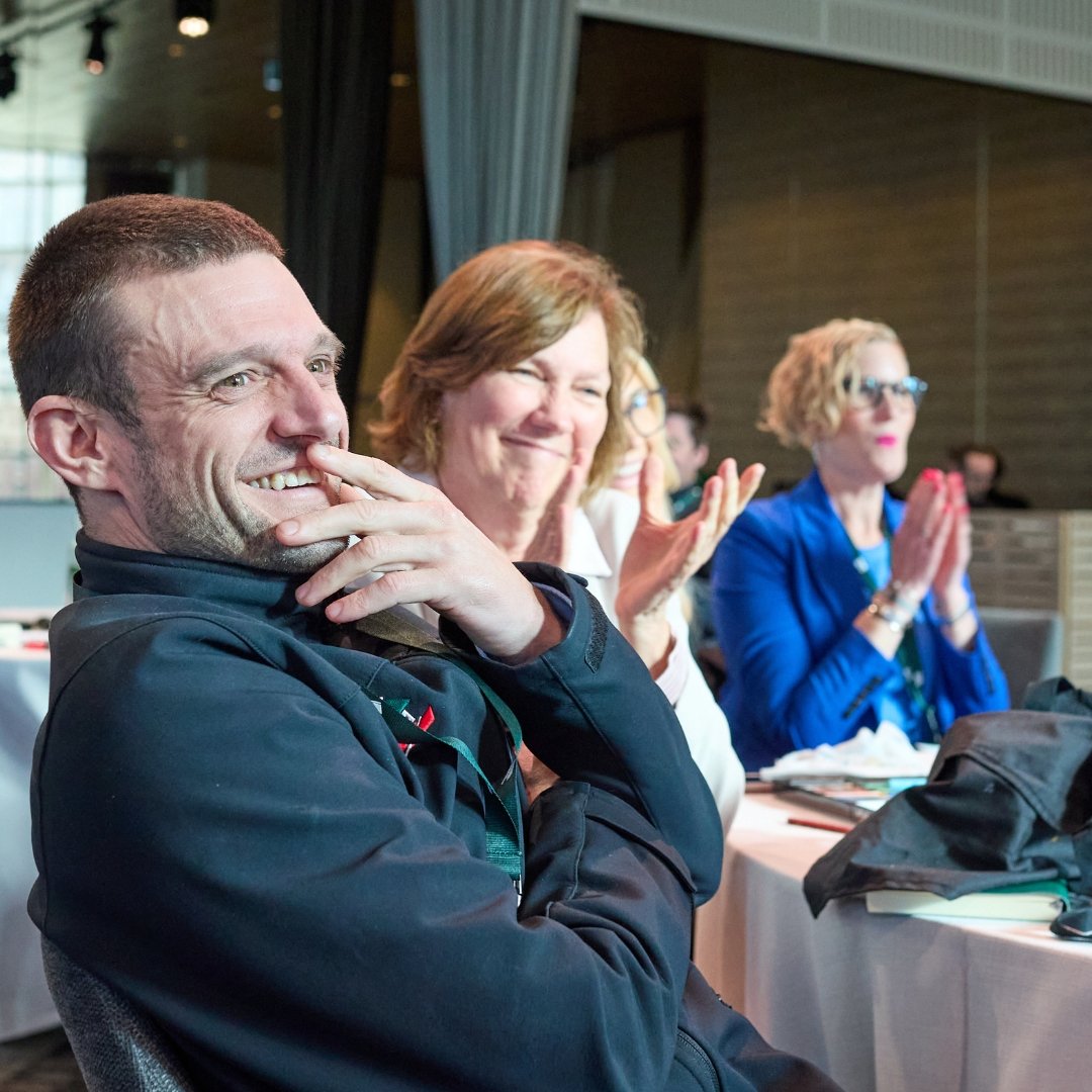 Team members engaged in a collaborative capability workshop facilitated by The Mind Gallery.