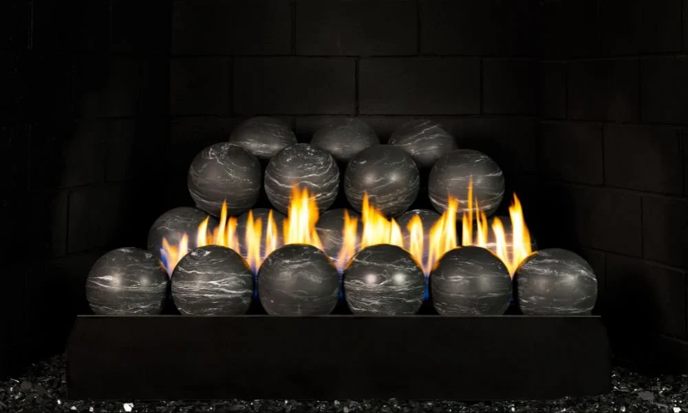 Nero Marquina G23 Fyre Spheres
Beautiful Nero Marquina Fyre Spheres provide a contemporary alternative to traditional gas logs. These 4″ robust spheres are a striking addition to your fireplace. Beautifully showcased on the new vent-free G23 Burner, 