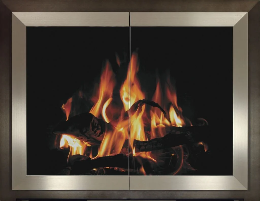 Fire burning inside a modern metal frame fireplace.