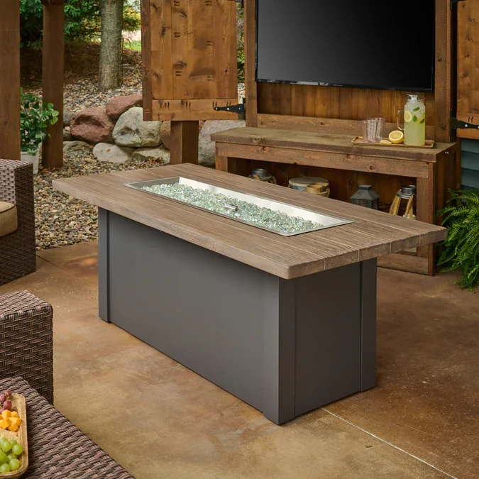 Outdoor Great Room, Havenwood Linear Gas Fire Pit Table 62" meticulously designed to elevate your outdoor living experience. Each fire pit table is hand-crafted by local artisans, so each piece is unique and one-of-a-kind. With both contemporary styl