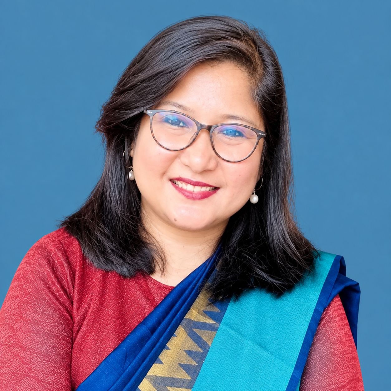 Headshot of Dr Puspanjali Adhikari