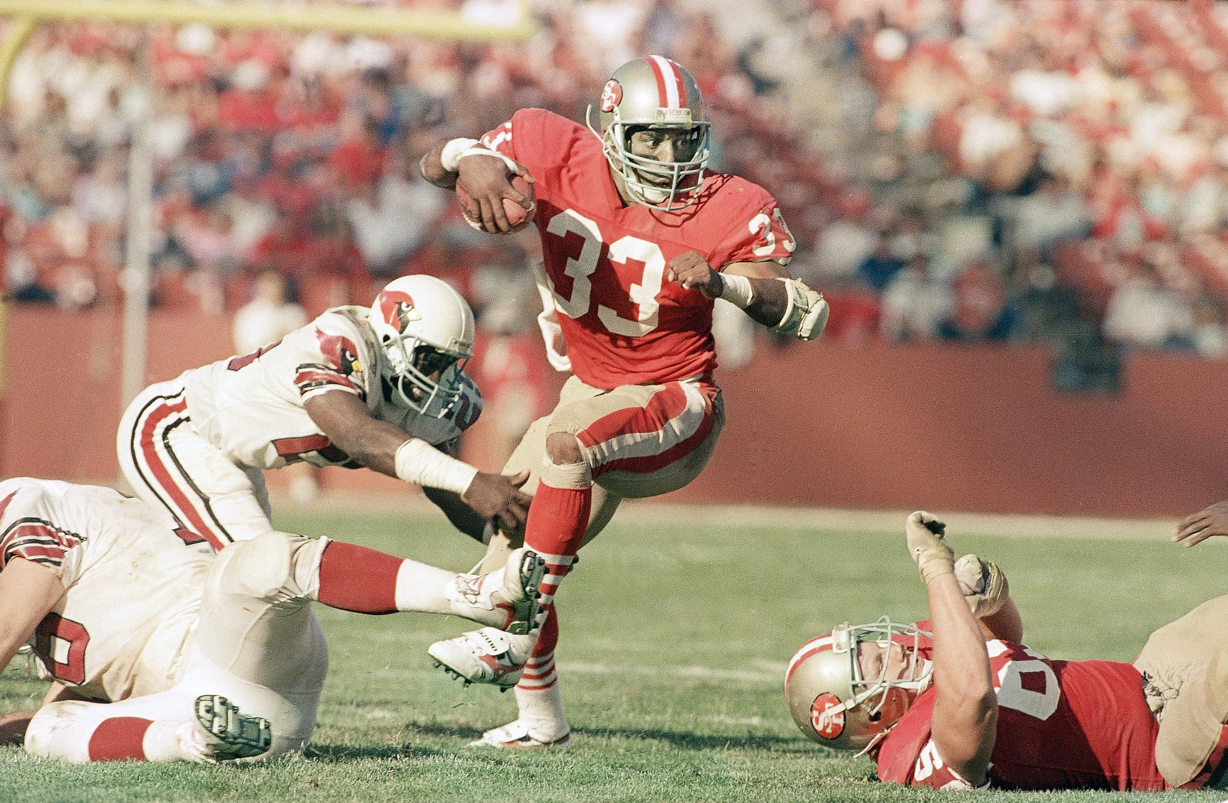 In 1978, he rushed for 1,565 yards and scored 27 touchdowns, earning high-school All-America recognition