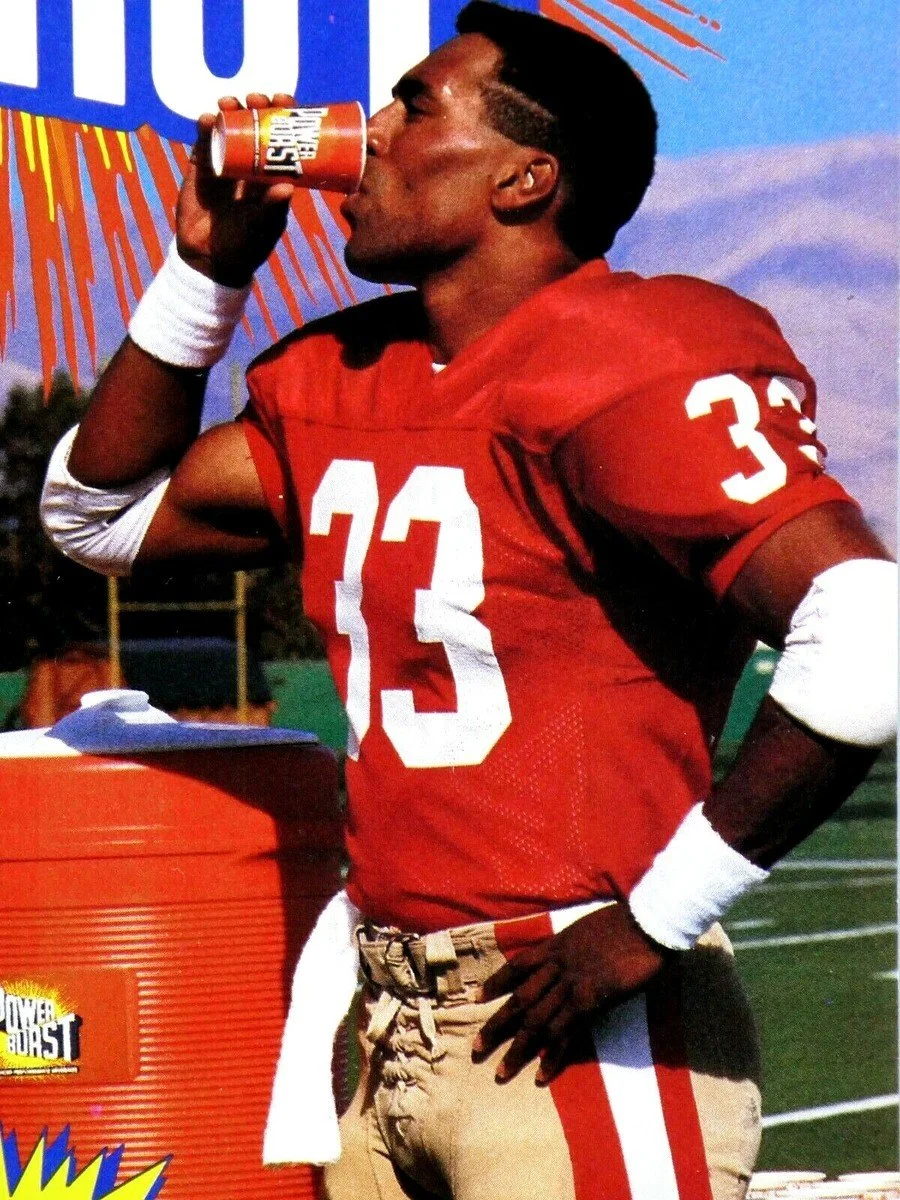 His iconic jersey number (33) equals 3 × 11, and he played 11 NFL seasons