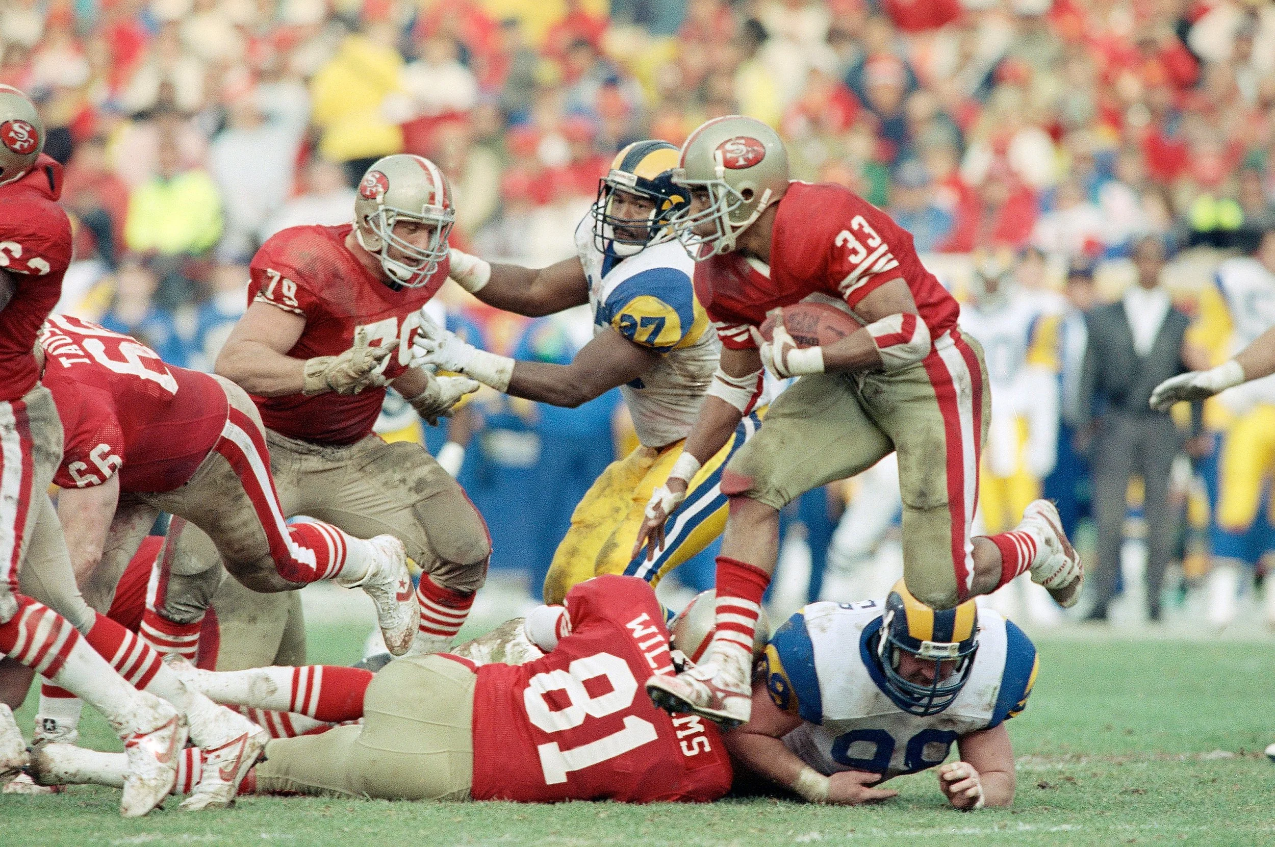In his 3rd season, he became the first in NFL history to run and receive for 1,000+ yards in the same season