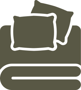 Three stacked towels with two smaller towels on top of a larger towel.