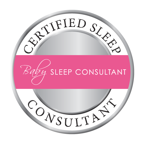 A circular badge with a silver and gray border. Inside, text reads 'Certified Sleep Consultant' around the top and bottom, with a pink banner across the center that says 'Baby Sleep Consultant' in white and cursive font.