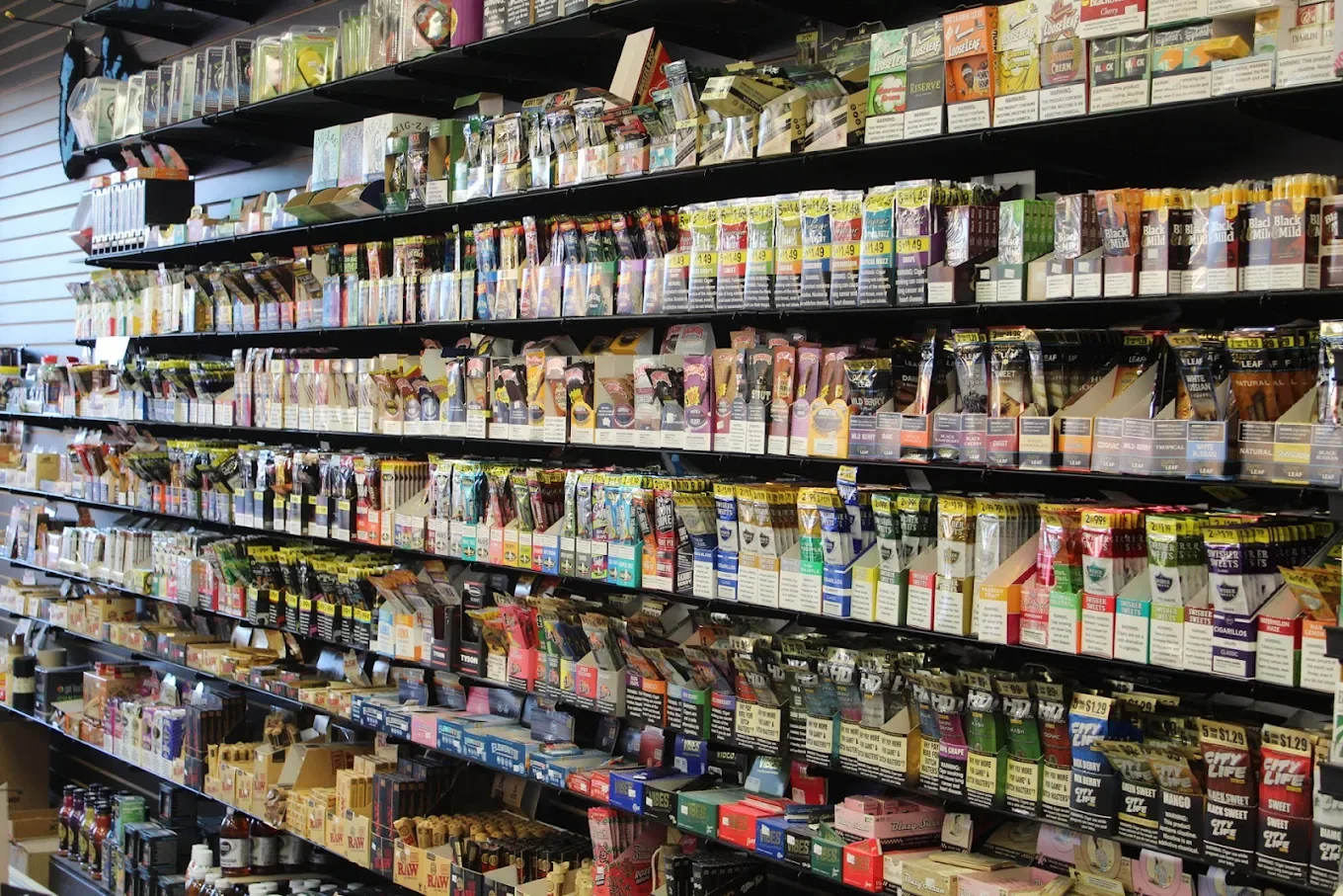 Shelves stocked with tobacco products