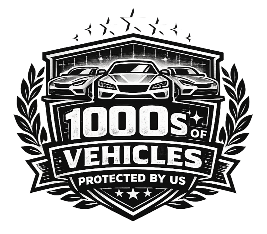 Black and white emblem featuring three cars, stars, and laurel leaves, with text that reads '1000s of Vehicles Protected by US.'