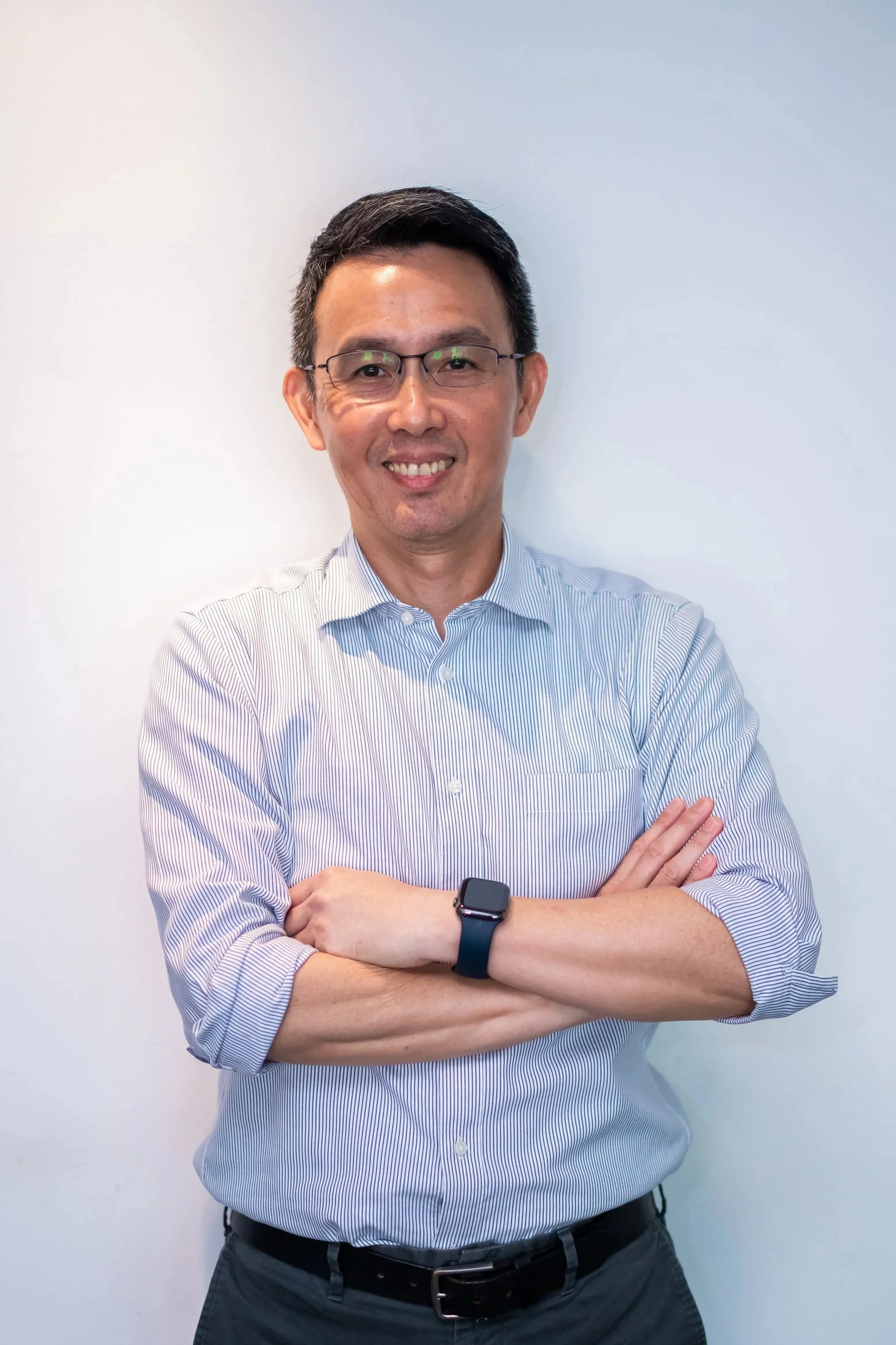 Professional portrait of Dr Chang chiropractor at The Chiropractic Way Singapore