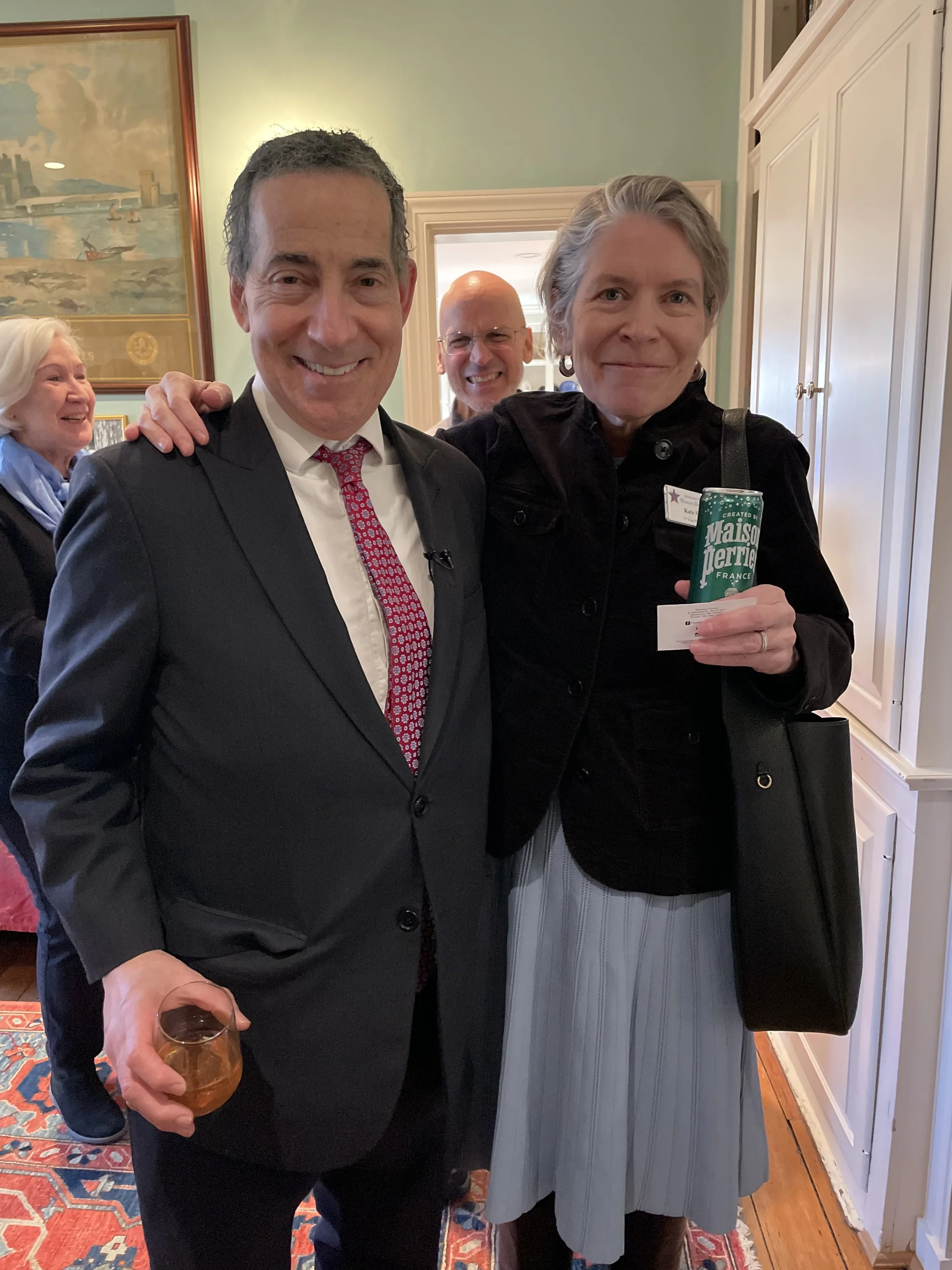 Jamie Raskin and Kate Stein hanging out at an event.