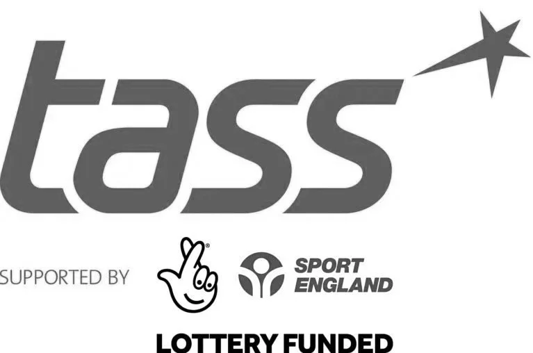 Gray logo of Tass with a shooting star graphic, supported by Sport England and Lottery funding.