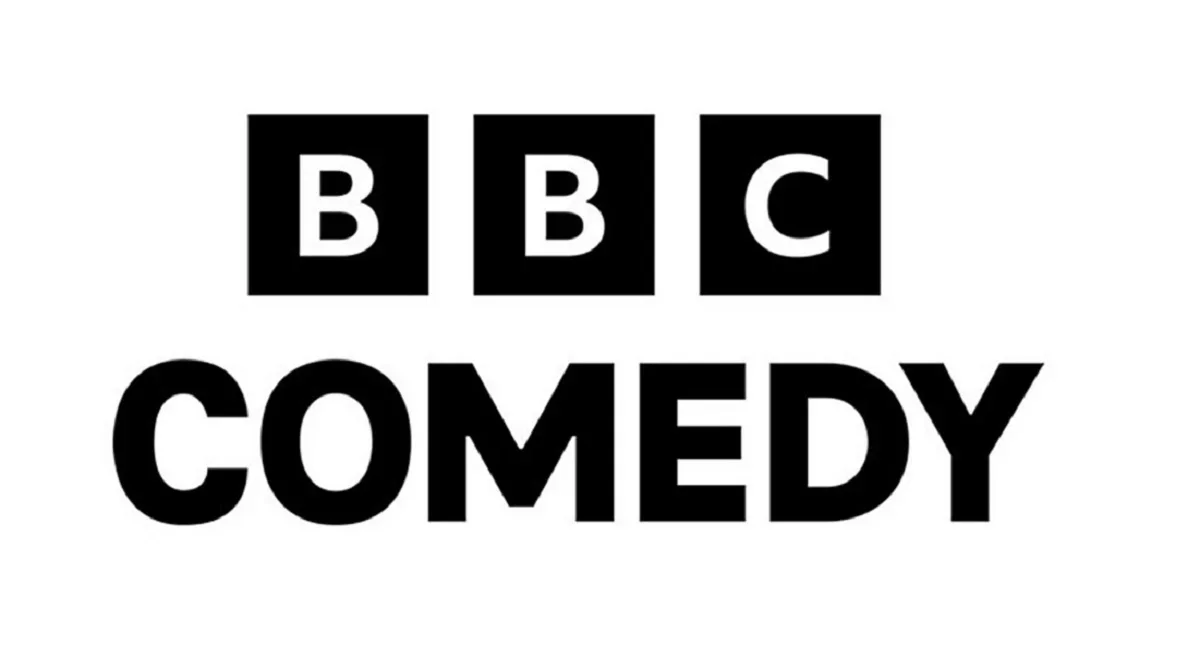 BBC Comedy logo with black squares containing white letters 'B', 'B', 'C' above the word 'COMEDY' in bold black letters.