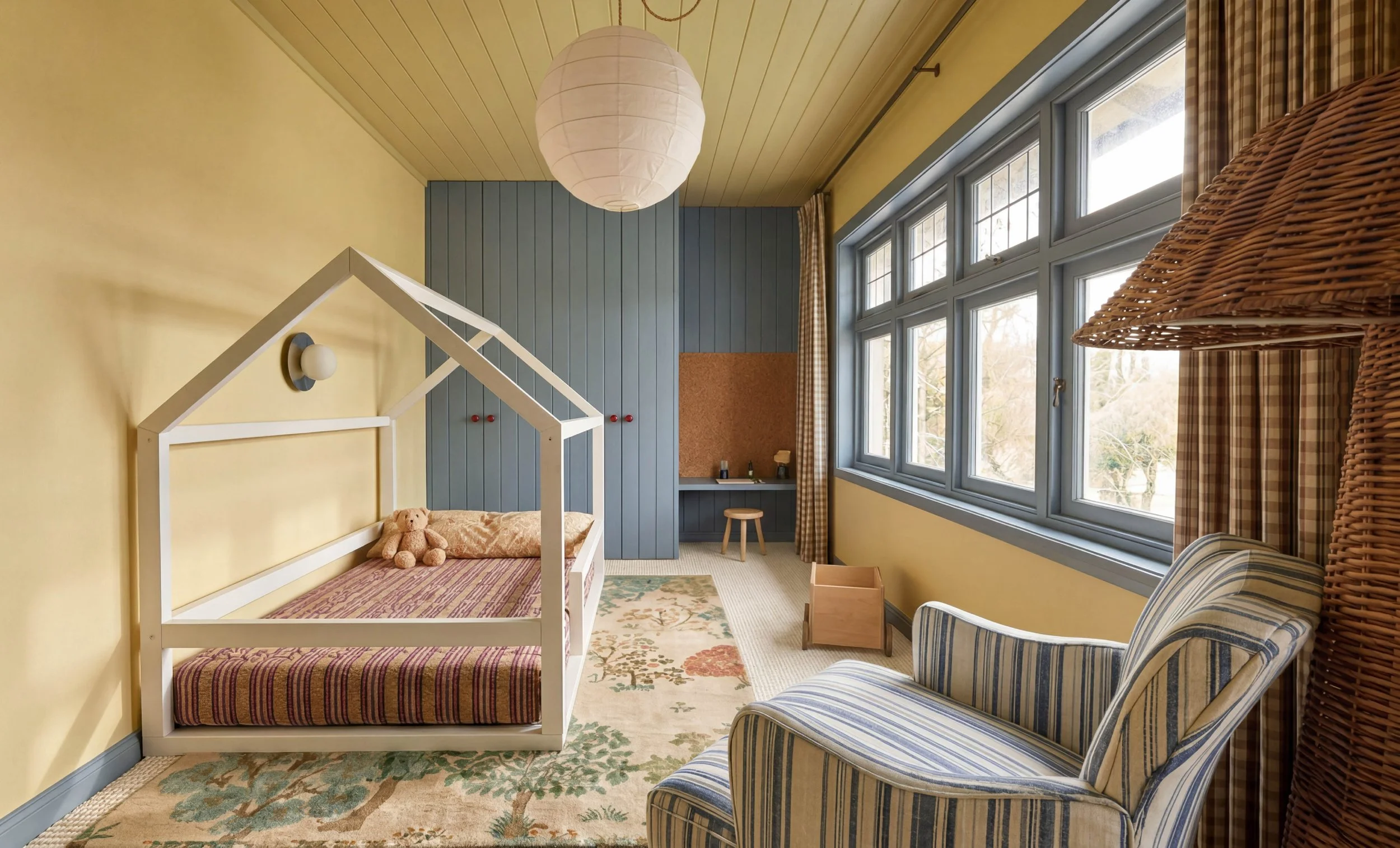  Residential children’s bedroom interior by Studio EWW featuring soft pastel tones, bespoke joinery and contemporary family home styling 