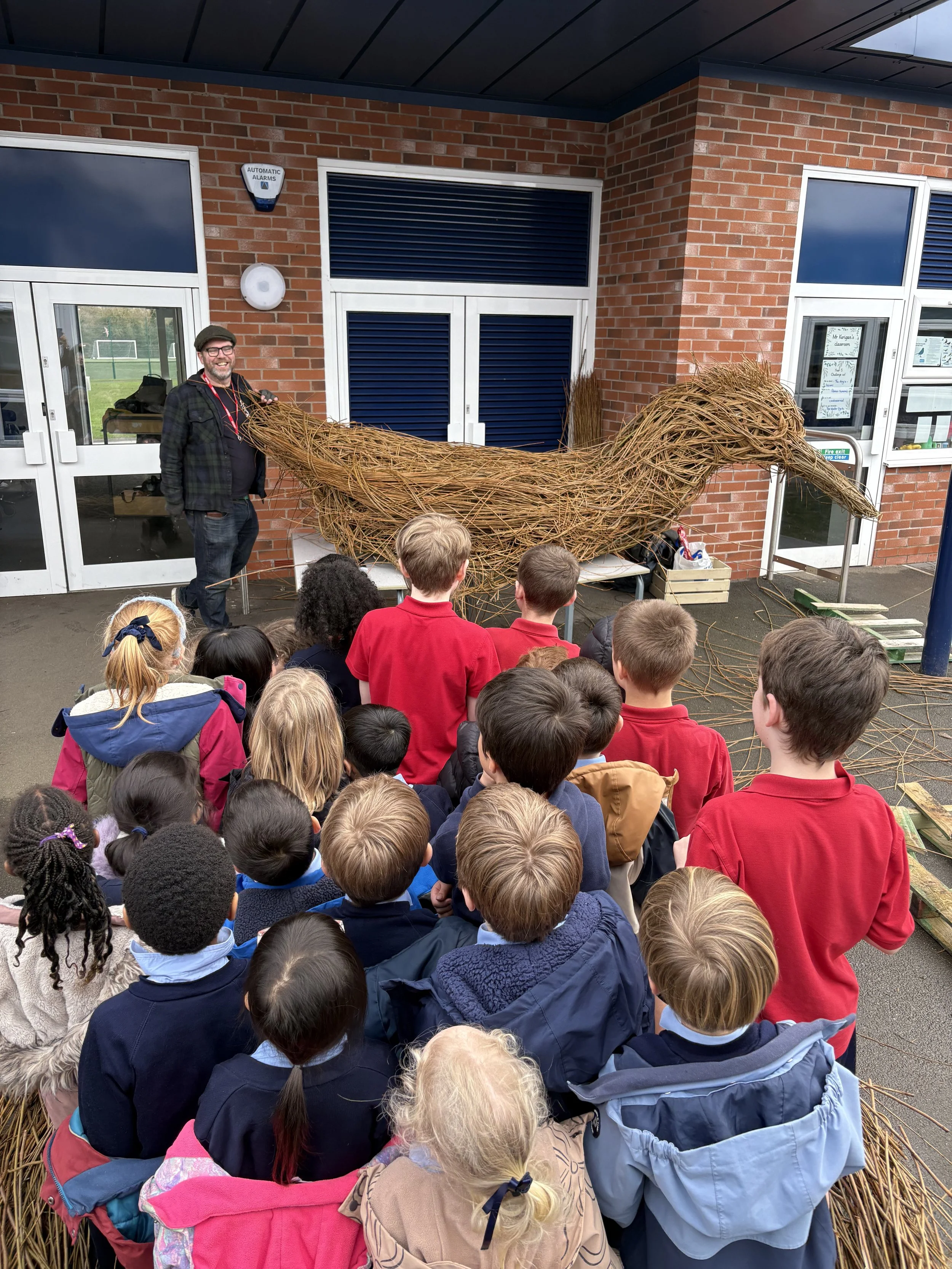 Vinny, the 10ft duck made from willow branches, outside St Vincents primary school Altrincham