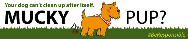 a banner reminding dog owners to clean up their dog's poo
