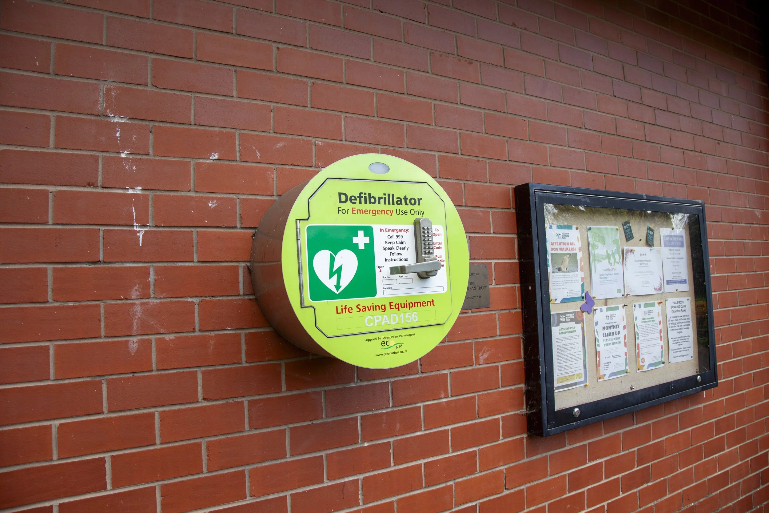 defibrillator installed on the side of the Bowling Pavilion