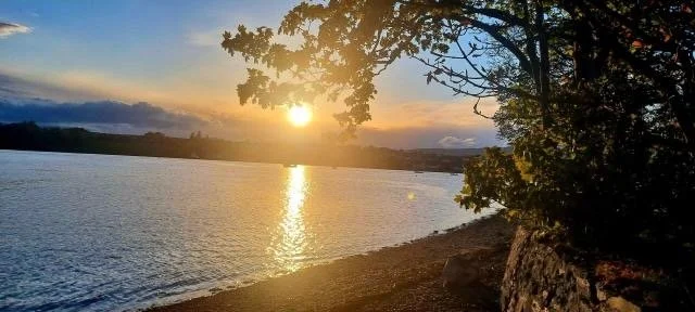 Sunset view of Lough Foyle shoreline from the cottage