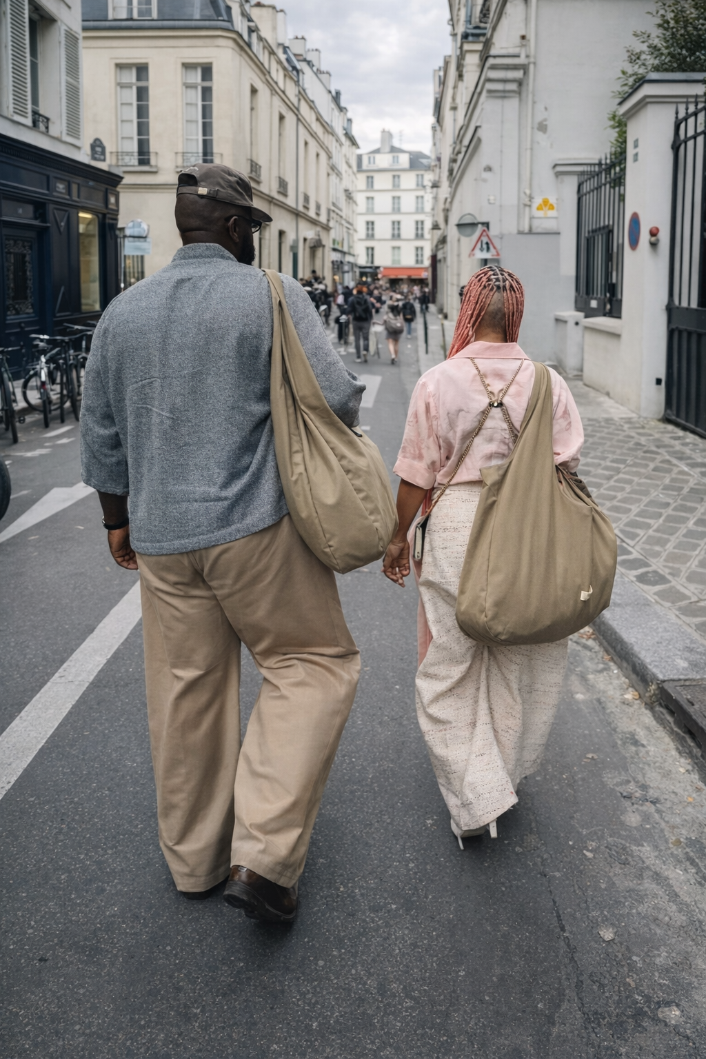 Tobe & Fat Nwigwe walking in Paris wearing the totes.