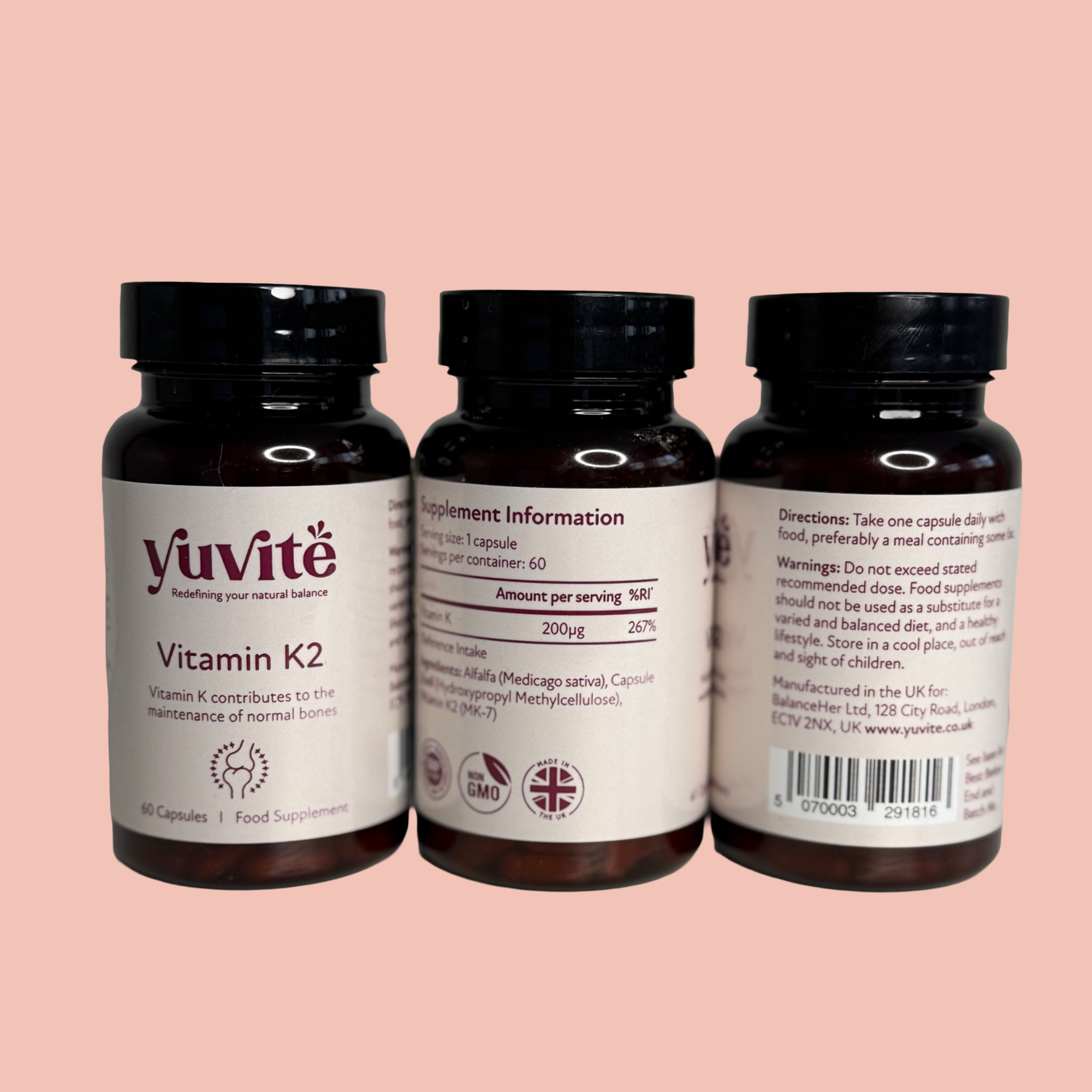 Three bottles on pink.PNG