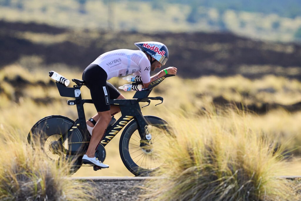 Triathlete cycling during long-distance triathlon race