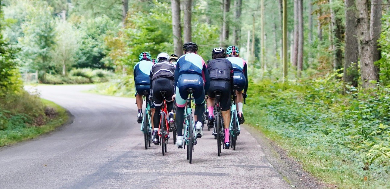 Group of cyclists riding during triathlon training