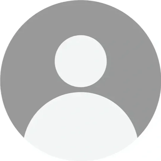 Generic user avatar icon with a gray circle background and a white silhouette of a person.