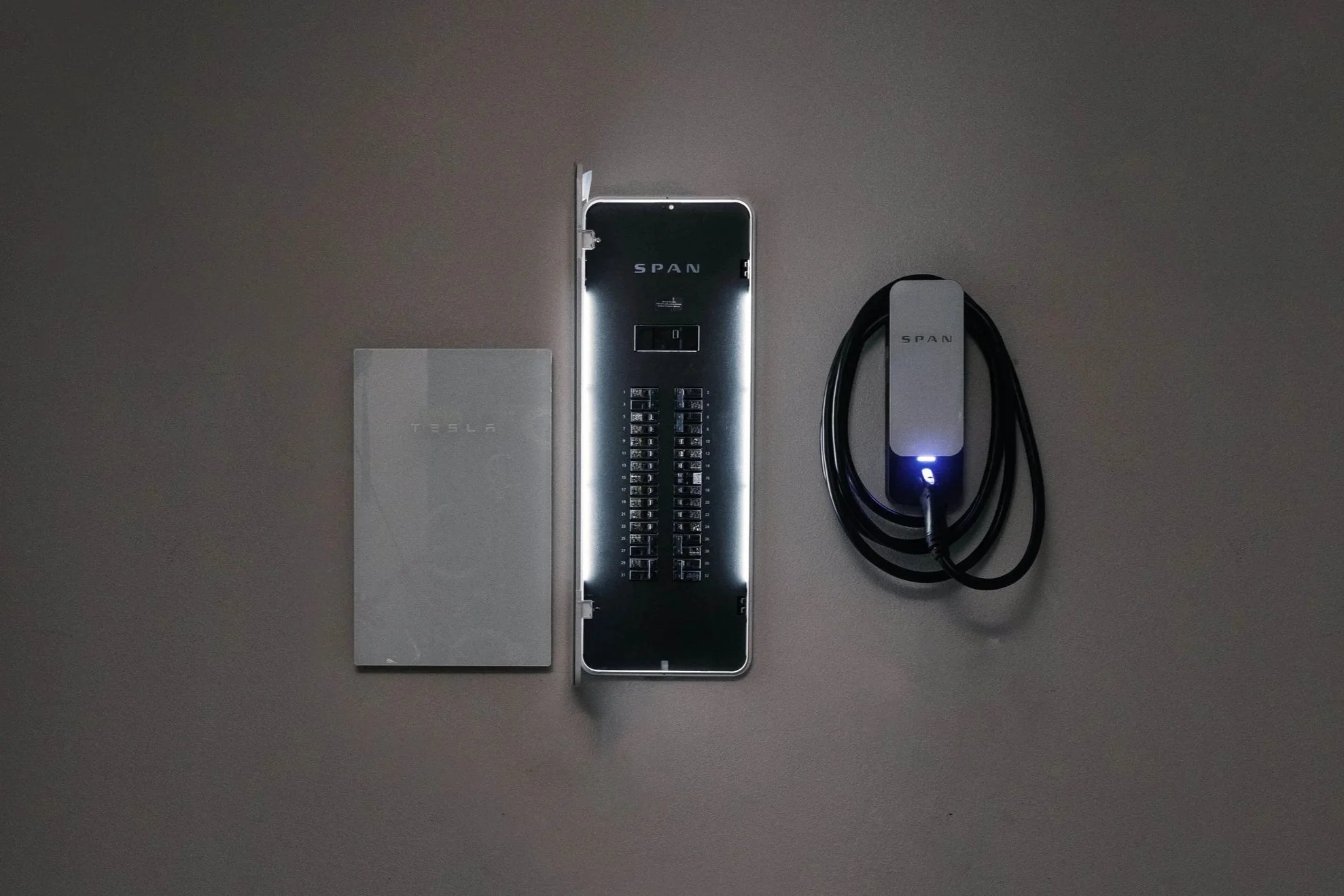 Tesla PowerWall and a SPAN smart electric panel for more efficient energy storage and load management.