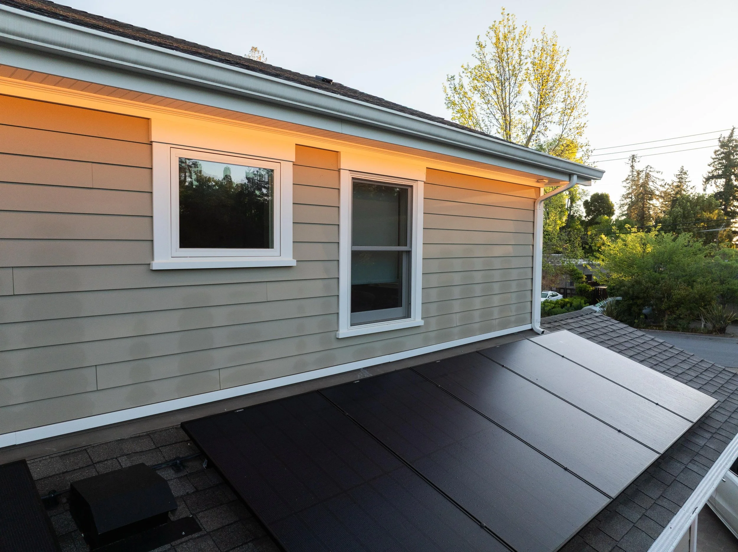 Energy production through rooftop solar energy, and lighting control through seamless exterior LED lights .