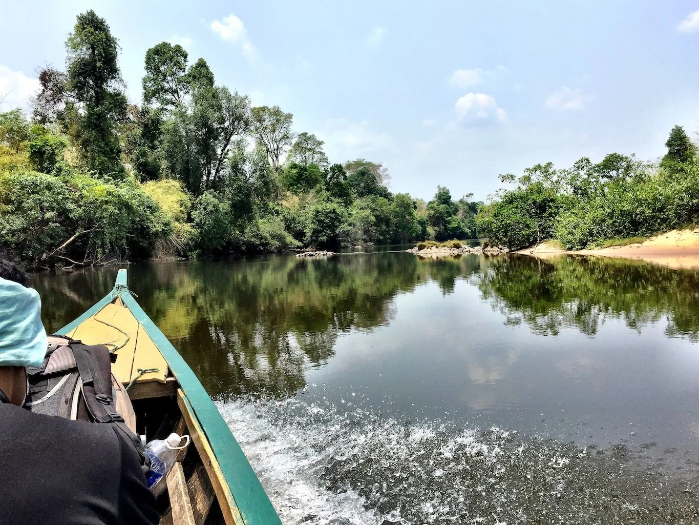 Boating along the Sesan River in Ratanakiri Province, Cambodia, to get to the forest reserve